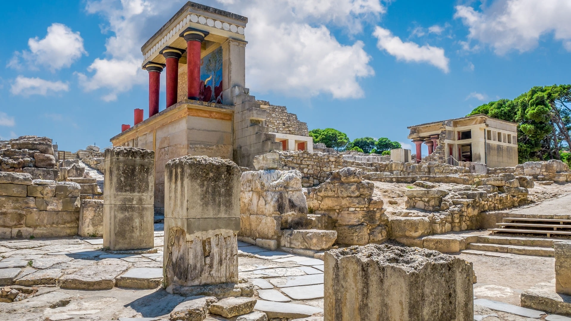 Exploring Knossos Palace's ancient ruins